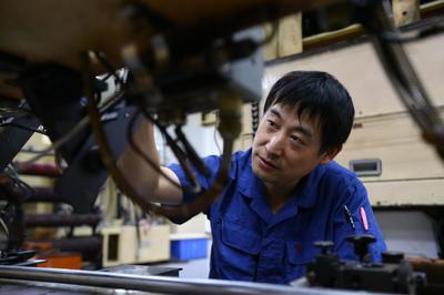 劉惠春:精印&ldquo;國家名片&rdquo;的人